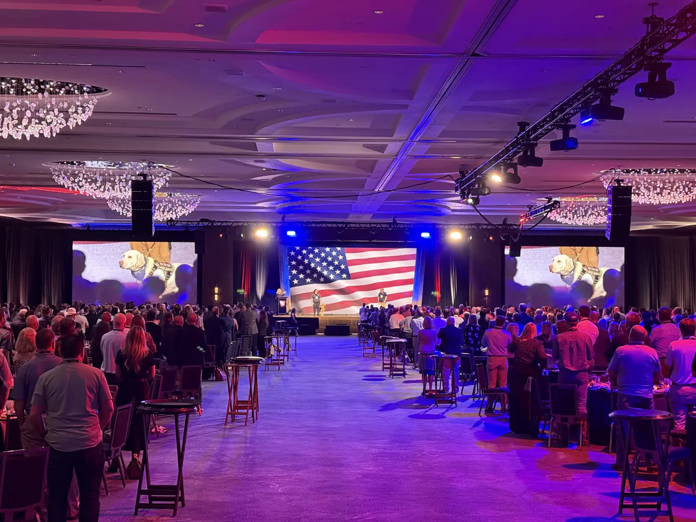 Full Gaylord Opryland ballroom general session with LED screens and audience