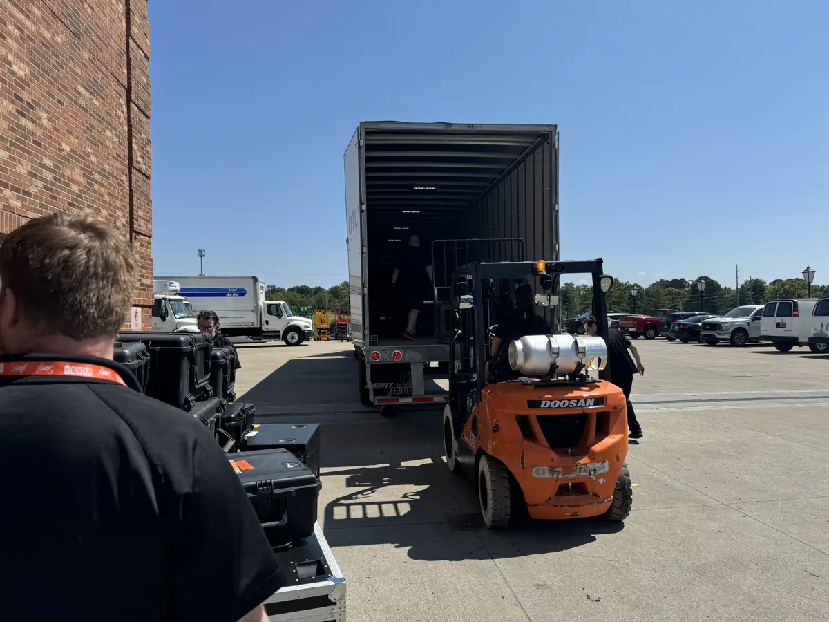 Orange Thread LIVE load-in at Gaylord Opryland with trucks and forklift