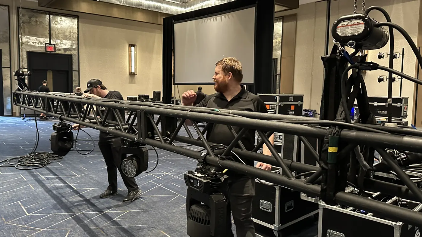 Orange Thread LIVE crew assembling truss with moving lights at JW Marriott Nashville