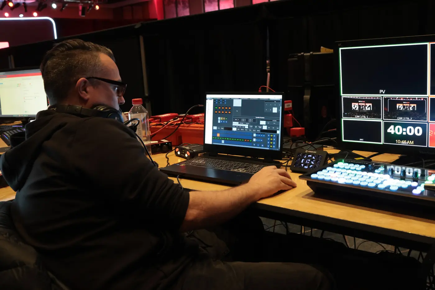 Orange Thread LIVE crew member running video switching at JW Marriott Nashville