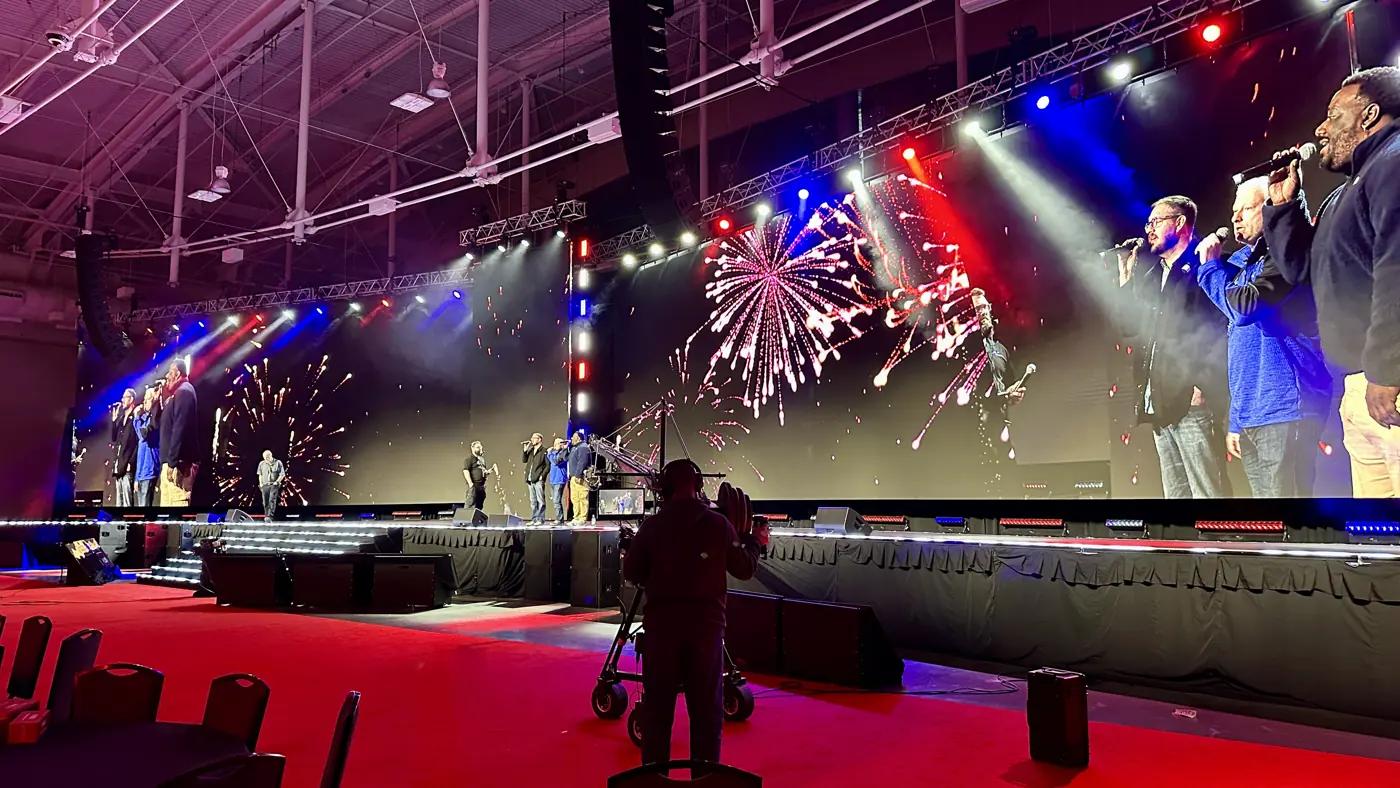 LED video wall stage with lighting and performers at Music City Center